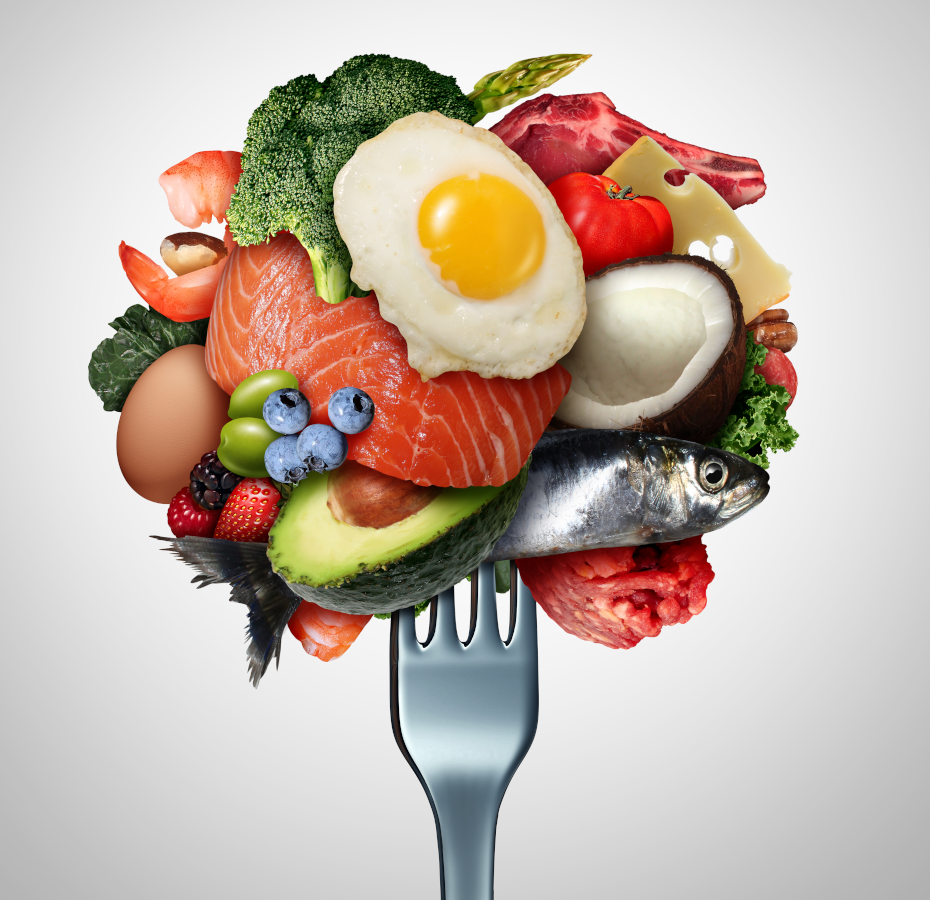 Fork with many different types of healthy food on it.
